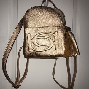 BEBE mini backspace in gold/rose gold